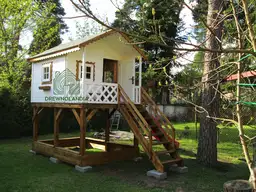 Domek dla dzieci Bolek - 2,8m x 2m z małym placem zabaw - zdjęcie 1